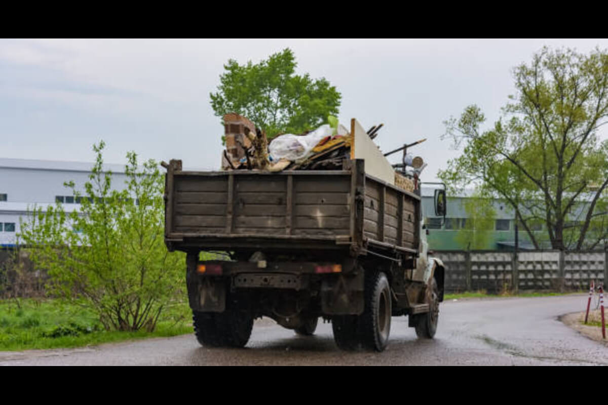 Local San Diego junk removal team standing in front of their truck